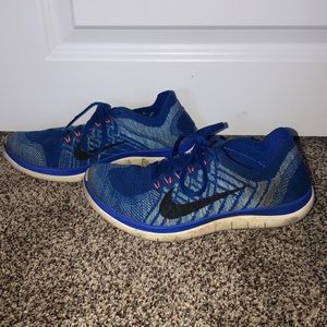 Blue Nike Flynit Tennis Shoes